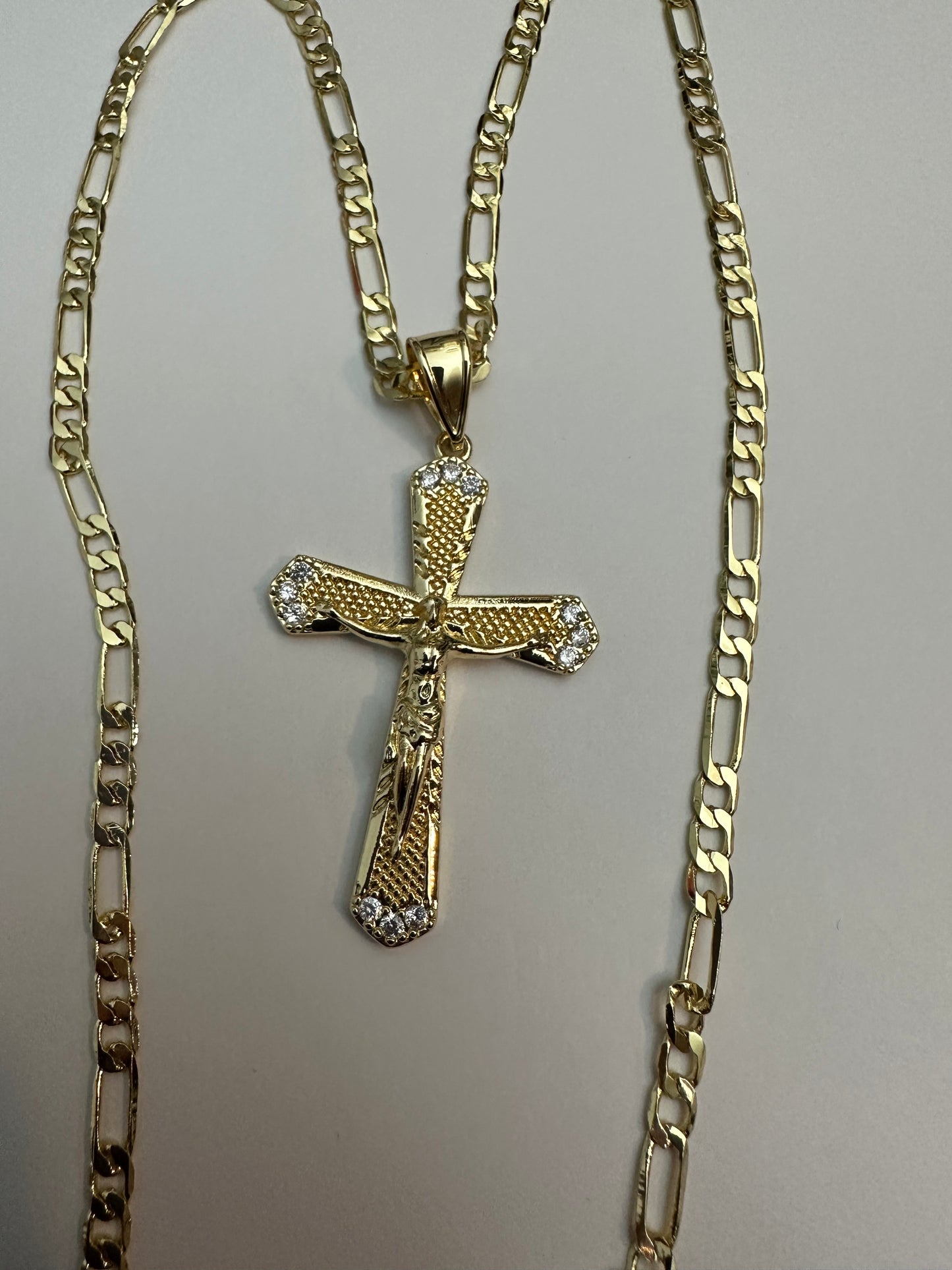 Crucifico with 24” inches figaro chain, gold plated necklace